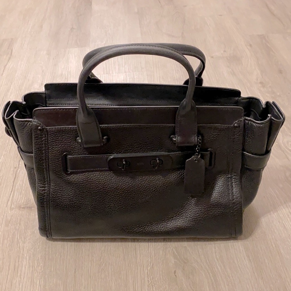 Coach large black leather bag.